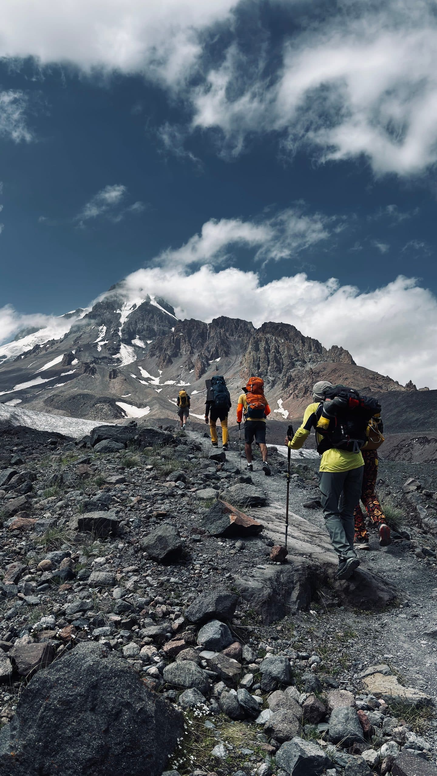 Mountaineer ascending a snowy peak