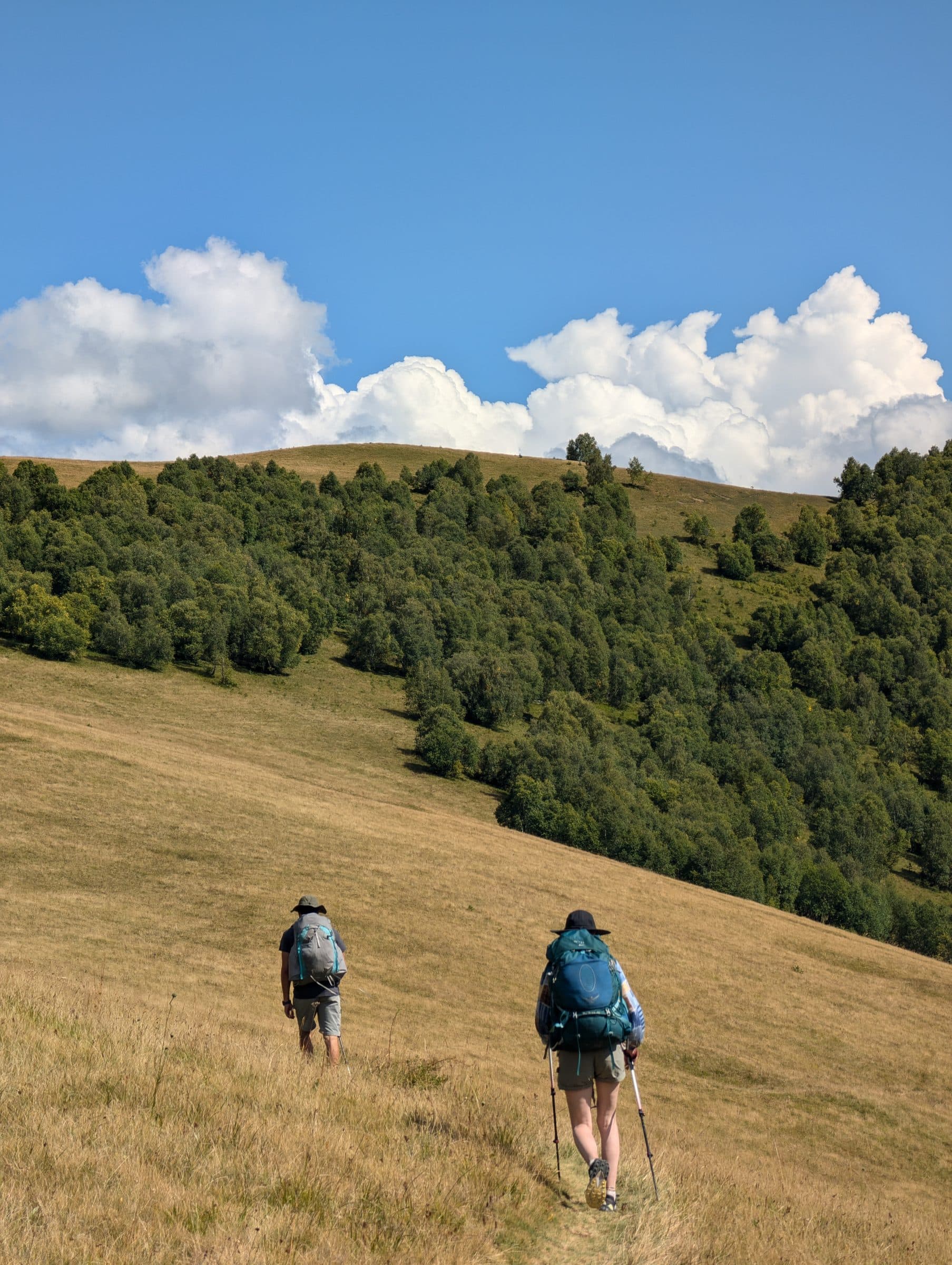 Group hiking the trail toward Mount Kazbek